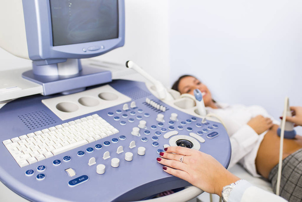 Young woman on ultrasound examination in hospital - Photo, Image