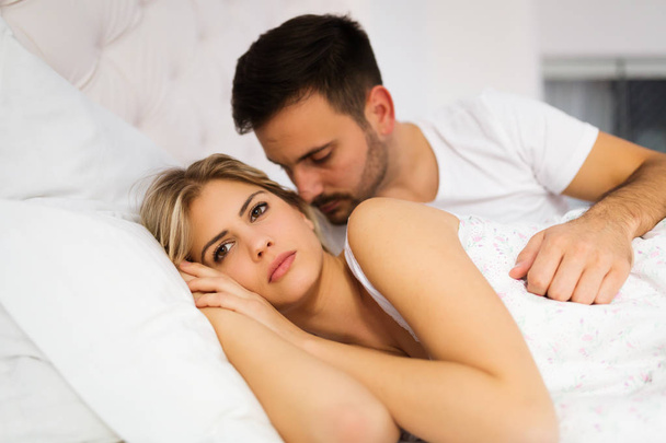 Young unhappy couple having problems in their relationship - Photo, Image