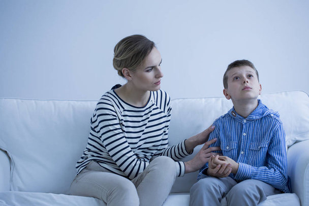 Autistic boy and carer - Foto, afbeelding