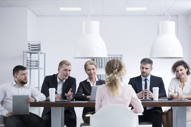 Group of recruiters interviewing woman - Photo, Image