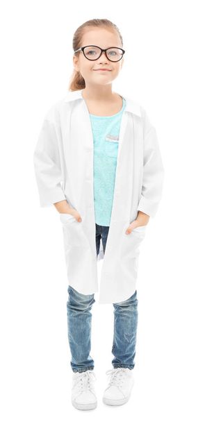 niña en uniforme de médico
  - Foto, Imagen