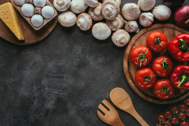 top view of different raw ingredients for pizza on concrete table - Fotoğraf, Görsel