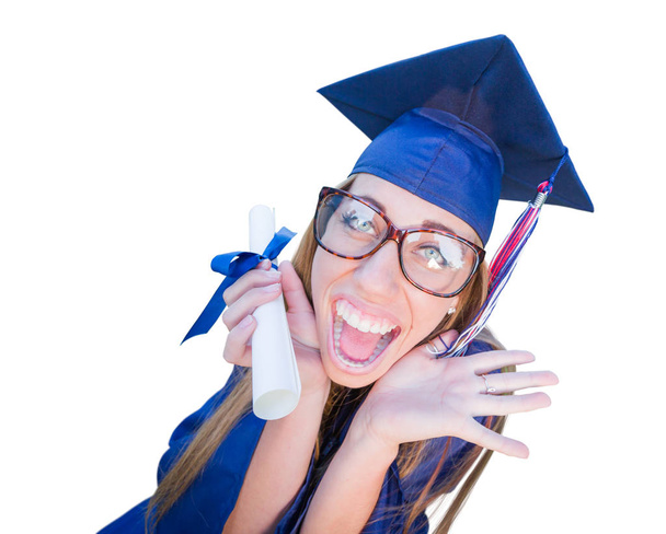 goofy Abschluss junge Mädchen in Mütze und Kleid isoliert auf weißem Hintergrund. - Foto, Bild