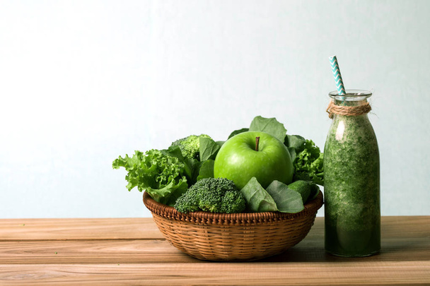 the Healthy fresh  green smoothie juice in the glass bottle on a - Photo, image