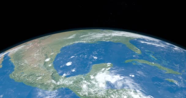 Animatie van de Golf van Mexico in het Midden-Amerika werelddeel in aarde vanuit de ruimte ronddraaien in time-lapse met het universum op achtergrond - Video