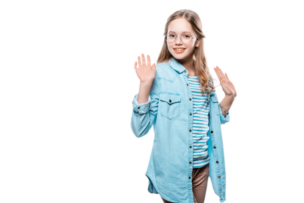 cute teenage girl raising hands and smiling at camera isolated on white - Φωτογραφία, εικόνα