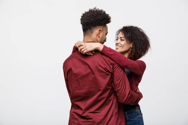 portrait of happy african american couple hug each other on white background. - Foto, Imagem