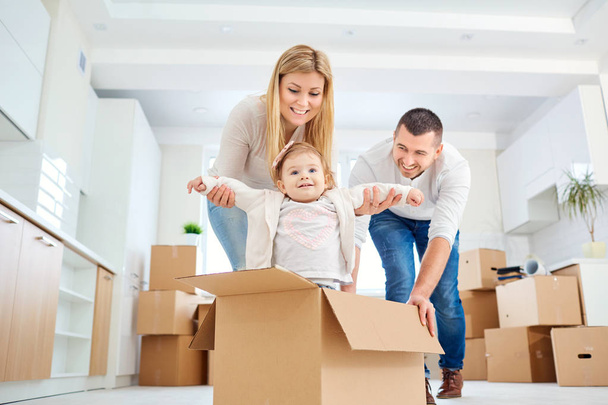 A happy family moves to a new apartment.  - Foto, imagen