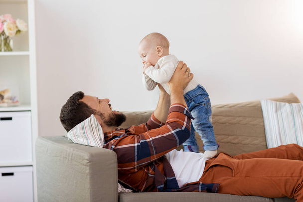 happy father with little baby boy at home - Foto, Imagem
