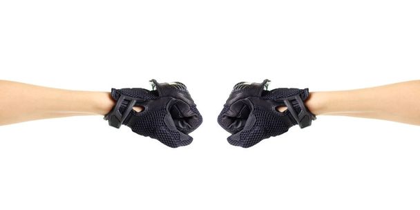 Sport black Moto gloves. Two fists in gloves. Isolated on white  - Valokuva, kuva