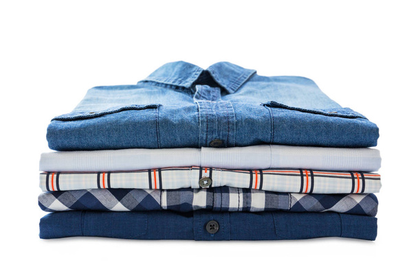 Stack of shirts isolated - Foto, immagini