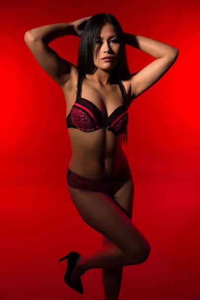 Filipina in red and black - Foto, imagen
