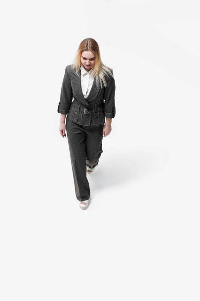 view from the top.young business woman walking forward - Foto, immagini