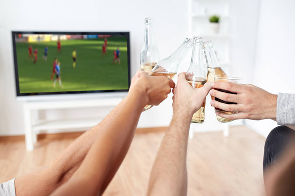 friends with beer watching football or soccer game - Foto, Imagem