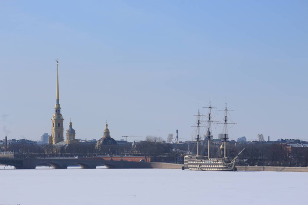 Russia, St. Petersburg, sailboat on the embankment of the river in winter - Photo, Image