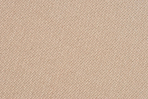 close up of a woolen fabric of beige color.  - Photo, image