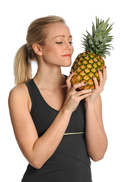 Young Woman Holding Pineapple - Фото, изображение