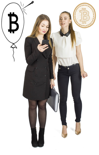 Beautiful women standing over white background with bitcoin sketches and talking. Virtual money concept. Cryptocurrency - Foto, afbeelding