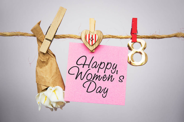 Happy Women's Day Card. celebrate 8 March, lollipop shape figure eight 8, note for text, flowers in colored buckets  - Fotó, kép