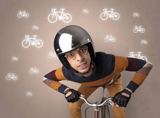 Lunatic cyclist with bike on the background - Valokuva, kuva