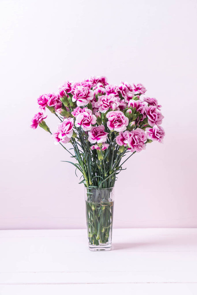 pink spring flower on wooden background - Fotó, kép