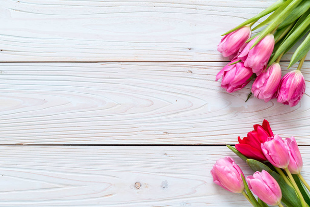 pink tulip flower on wood background - Zdjęcie, obraz