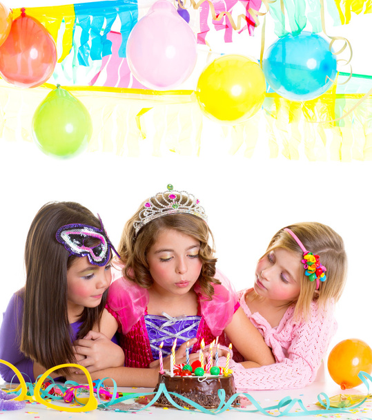 children happy girls blowing birthday party cake - Zdjęcie, obraz