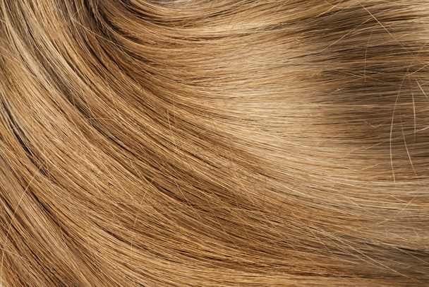 Long blond human shiny hair - Photo, Image