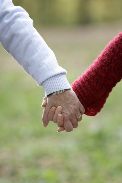 Holding hands - Φωτογραφία, εικόνα