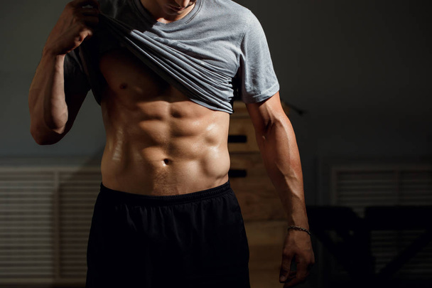 Strong Athletic Man Fitness Model Torso showing six pack abs - 写真・画像