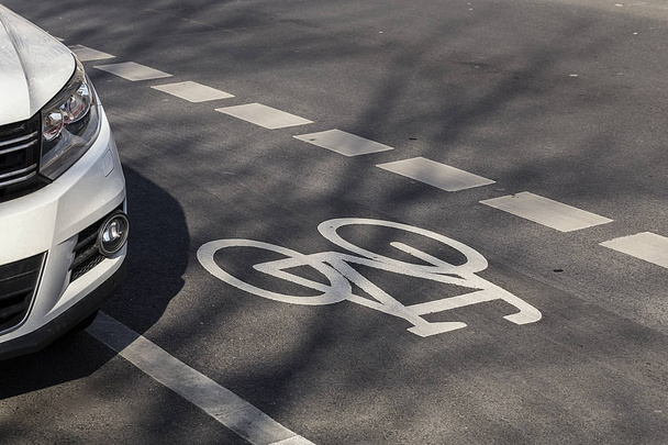close-up photo of sporty bicycle signs outdoor on road - Φωτογραφία, εικόνα