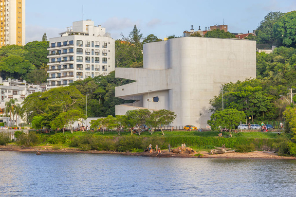 Guaiba lake beach with buildings and trees - Photo, Image