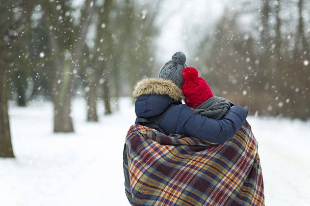 Couple in love in winter scenery - Photo, Image