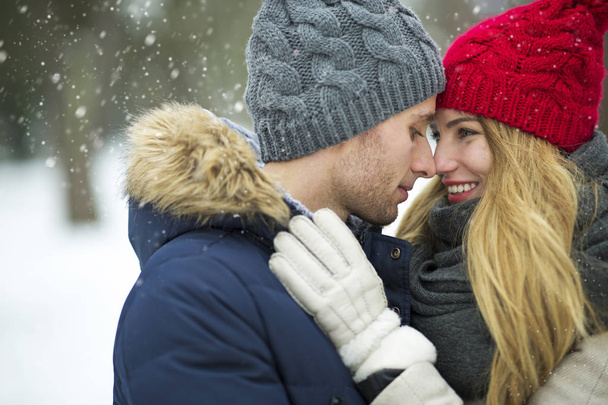 Couple in love in winter scenery - Foto, immagini