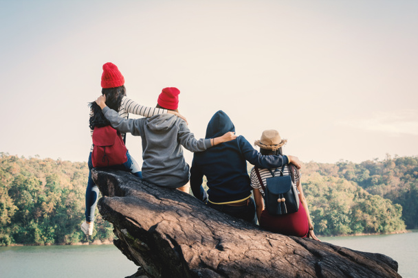 Group of friends enjoy in nature , Relax time on holiday concept ,selective and soft focus,tone of hipster style - Foto, Imagen