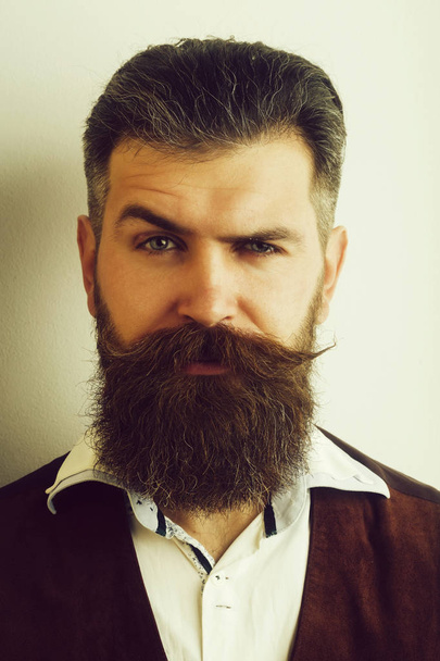 bearded man, brutal caucasian hipster with serious face - Fotó, kép