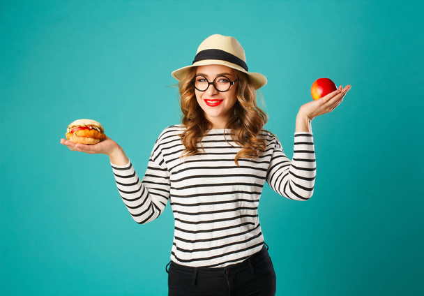 Portrait of young beautiful blond woman wearing glasses and hat  - Photo, image