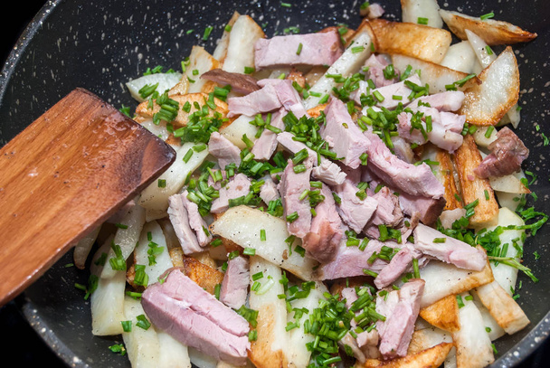 Fried potatoes with ham and green onions - Photo, Image