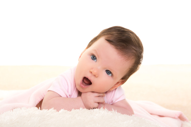 baby girl open mouth funny gesture in pink - Foto, immagini