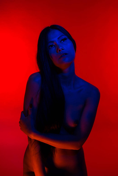 Filipina in blue and red - Фото, изображение
