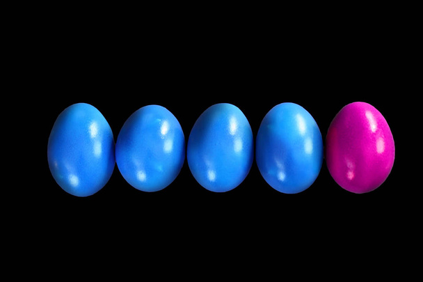 colored eggs on dark background, close-up  - Foto, immagini
