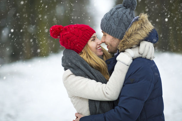 Couple in love in winter scenery - Zdjęcie, obraz
