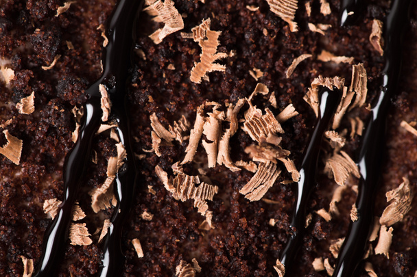 Volledige frame van chocolade en glazuur op taart  - Foto, afbeelding