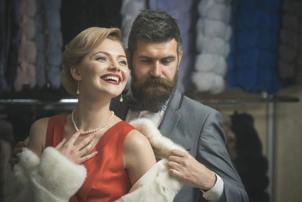 Couple in love among fur coat, luxury. - Фото, изображение