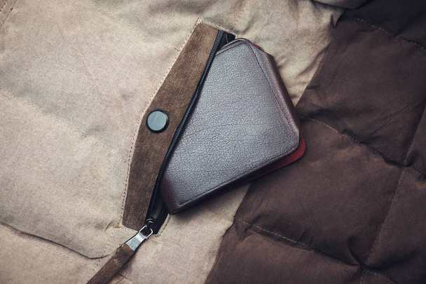wallet on coat background - Foto, Imagen