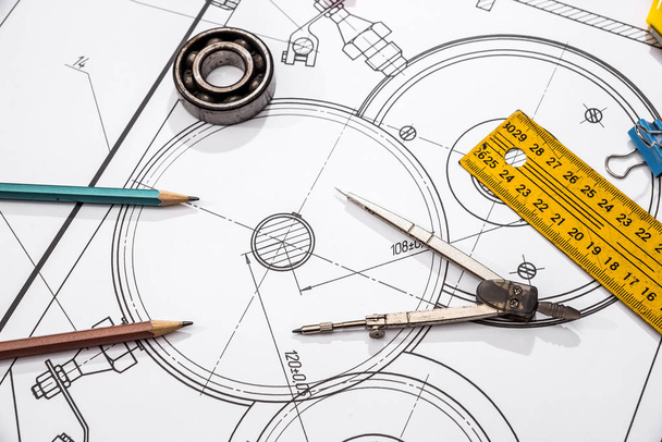 Engineering drawings with calculator, ruler, compass and pencil - Photo, Image