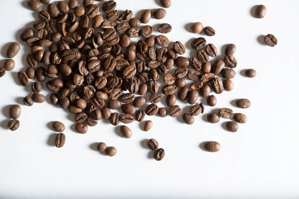coffee beans scattered on white background isolate - Photo, image