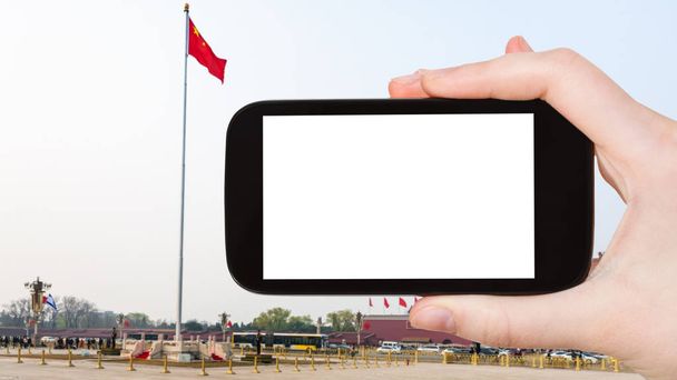 tourist photographs flag on Tiananmen Square - Photo, Image