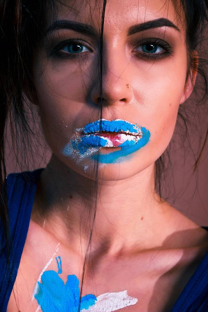 lips on the face,lips in paint,make-up with paint - 写真・画像