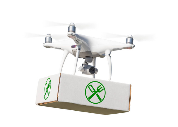 Unbemanntes Flugzeugsystem (uav) Quadrocopter-Drohne mit Lebensmitteletikett auf weißem Grund. - Foto, Bild